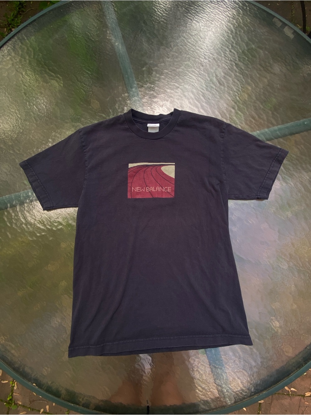 New Balance Men's Black Tee with Red Graphic Patch